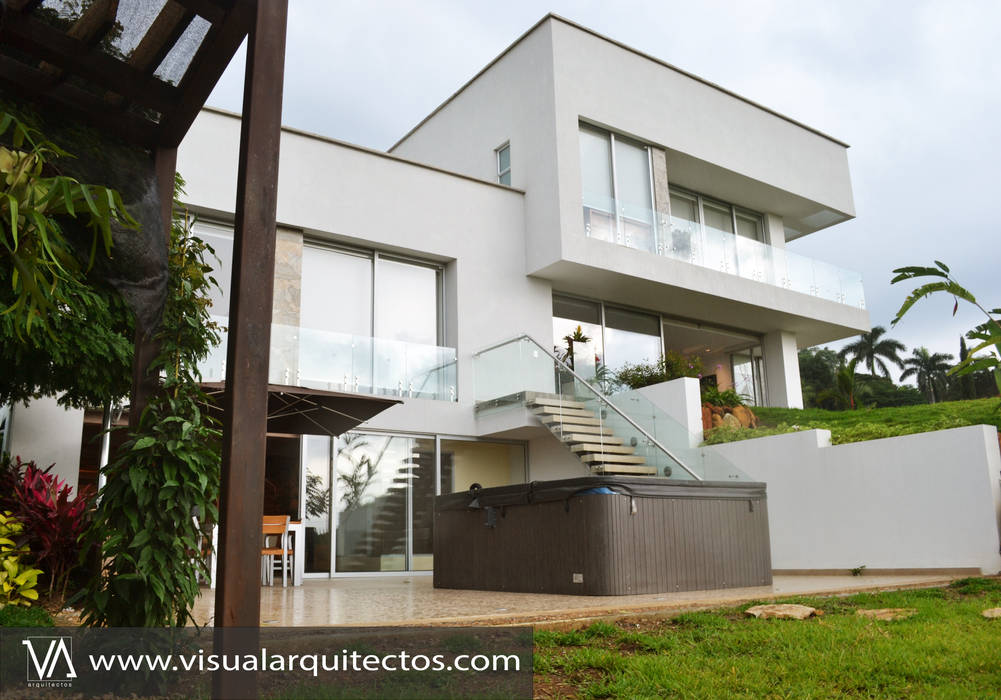 Casa Gaviria, Visual Arquitectos Visual Arquitectos Casas de madera