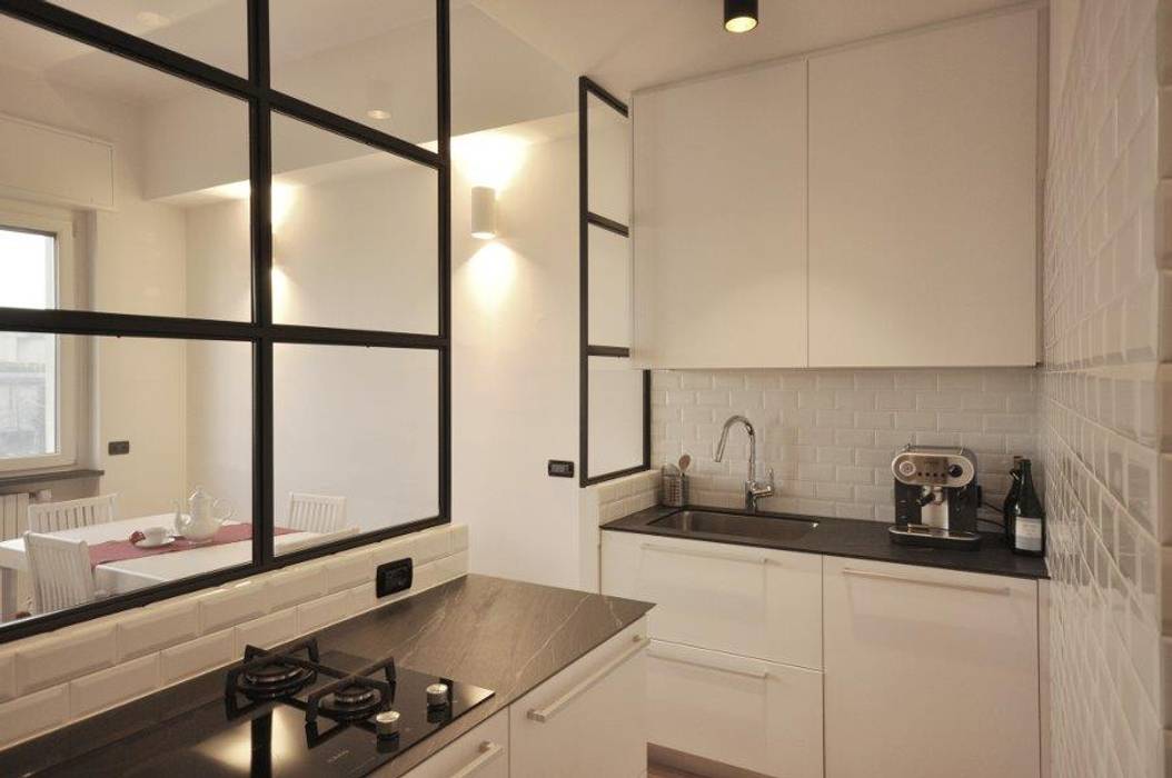 Sile industriale a Milano, Arch. Silvana Citterio Arch. Silvana Citterio Built-in kitchens Glass