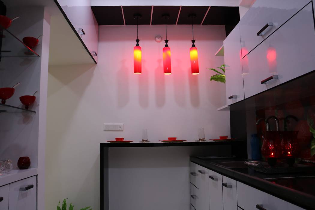 Breakfast Counter with Hanging Lights Enrich Interiors & Decors Built-in kitchens