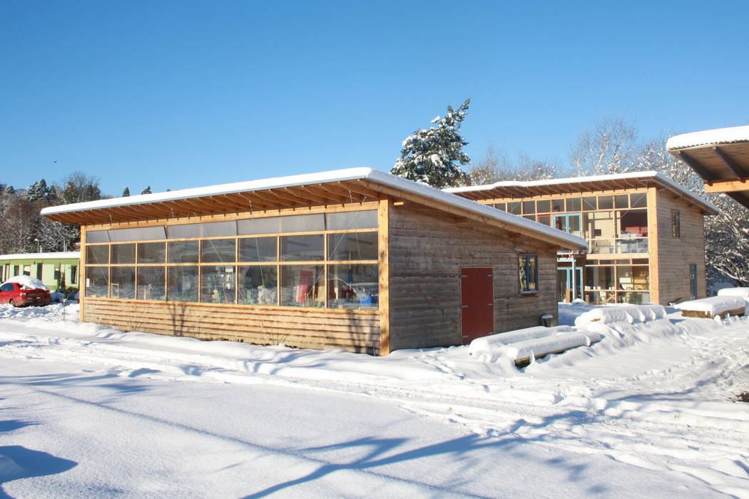 Front of Passive Workshop with Solar Passive House behind. David Colwell Design Passive house Wood Wood effect