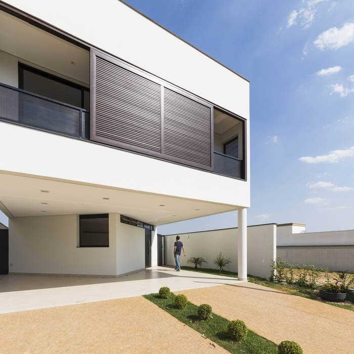 Fachada principal Vertentes Arquitetura Condomínios brises,fachada