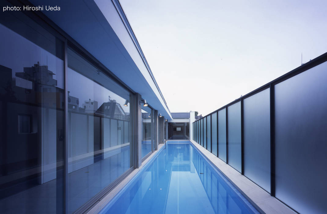 東京でプールのある家, 石川淳建築設計事務所 石川淳建築設計事務所 Minimalist pool Concrete