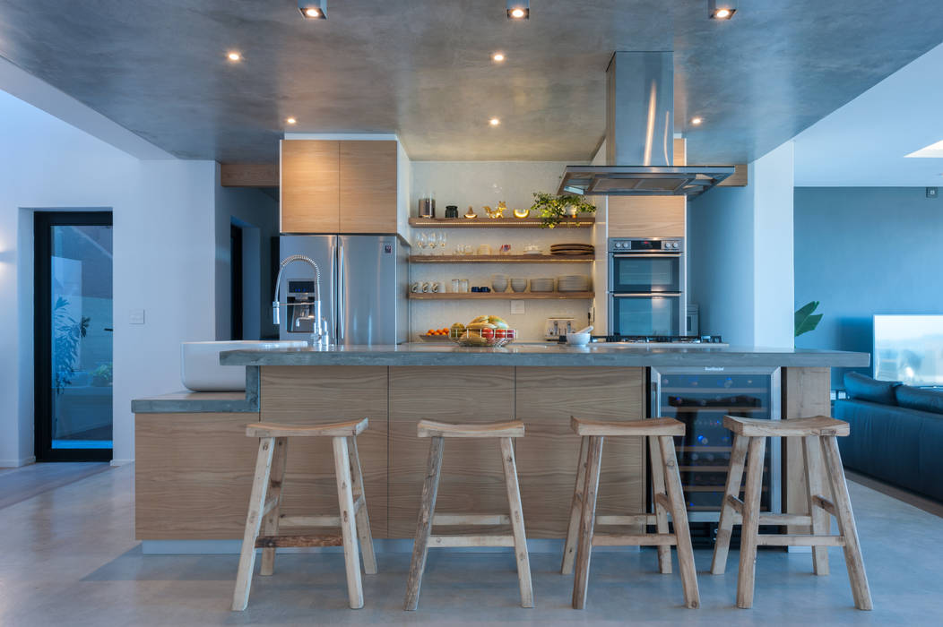 Oak kitchen with concrete tops JBA Architects Kitchen units Wood Wood effect concrete tops,oak cupboards,cement floor