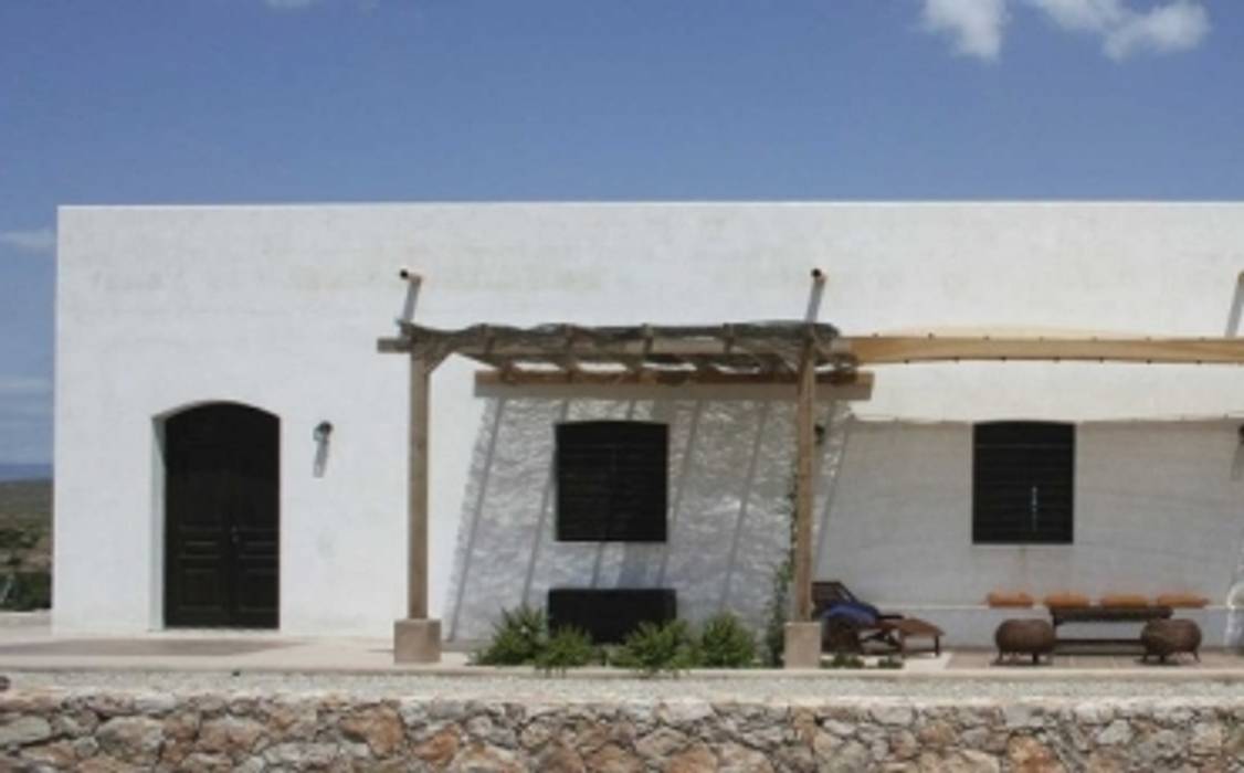 Rehabilitación del Hornillo. Casa rural La Tenada AGRANEL ARQUITECTURA Casas rurales Piedra