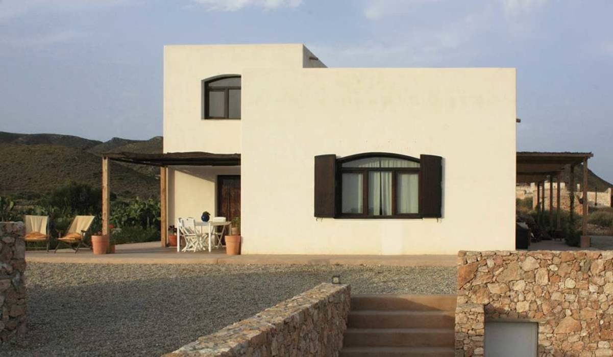 Rehabilitación del Hornillo. Casa rural La Tenada, AGRANEL ARQUITECTURA AGRANEL ARQUITECTURA Country house Stone