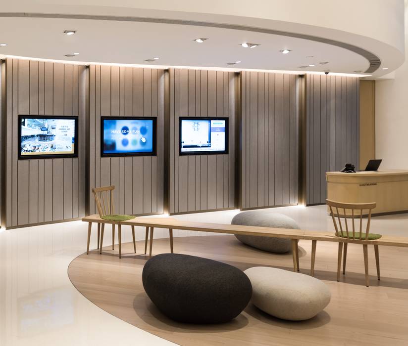 Aedas Interiors creates a minimal aesthetic with sculptural forms for Novotel Century Hong Kong’s high traffic lobby , Architecture by Aedas Architecture by Aedas Commercial spaces Hotels
