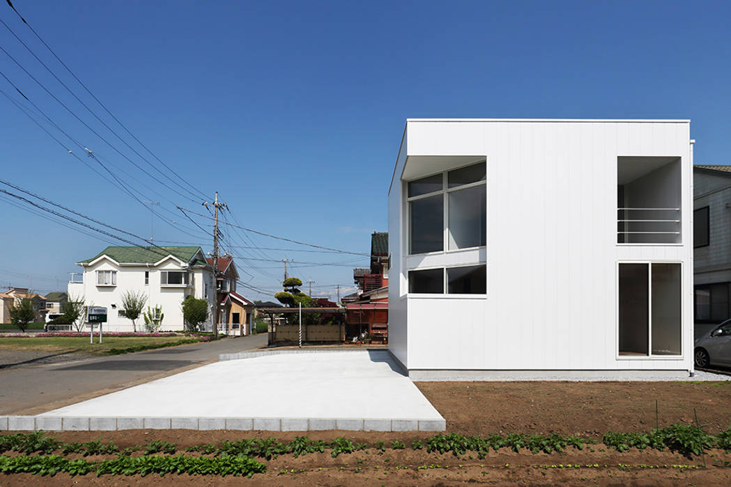 side, *studio LOOP 建築設計事務所 *studio LOOP 建築設計事務所 Casas modernas: Ideas, imágenes y decoración