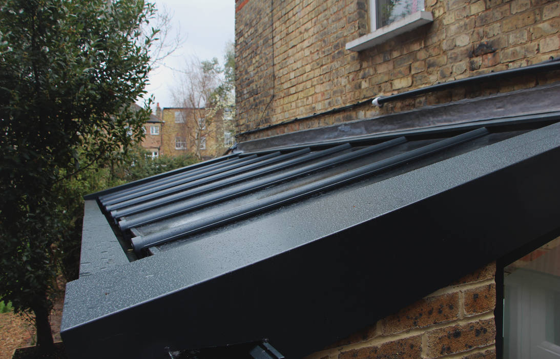 New Roof RS Architects Lean-to roof Metal Metal,metal roof,brick,brick wall,glass ceiling,rooflight,side extension,kitchen extension,haringey