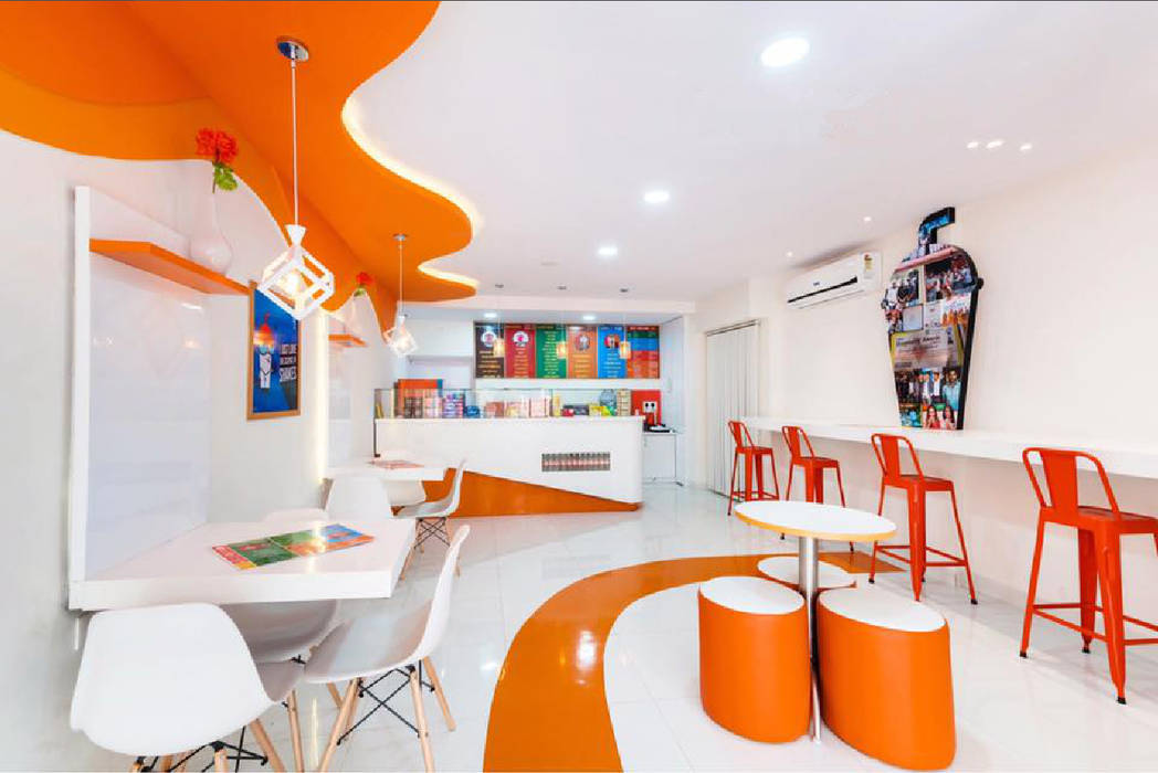 A very vibrant colour theme cafe interiors Rhythm And Emphasis Design Studio Commercial spaces Gastronomy