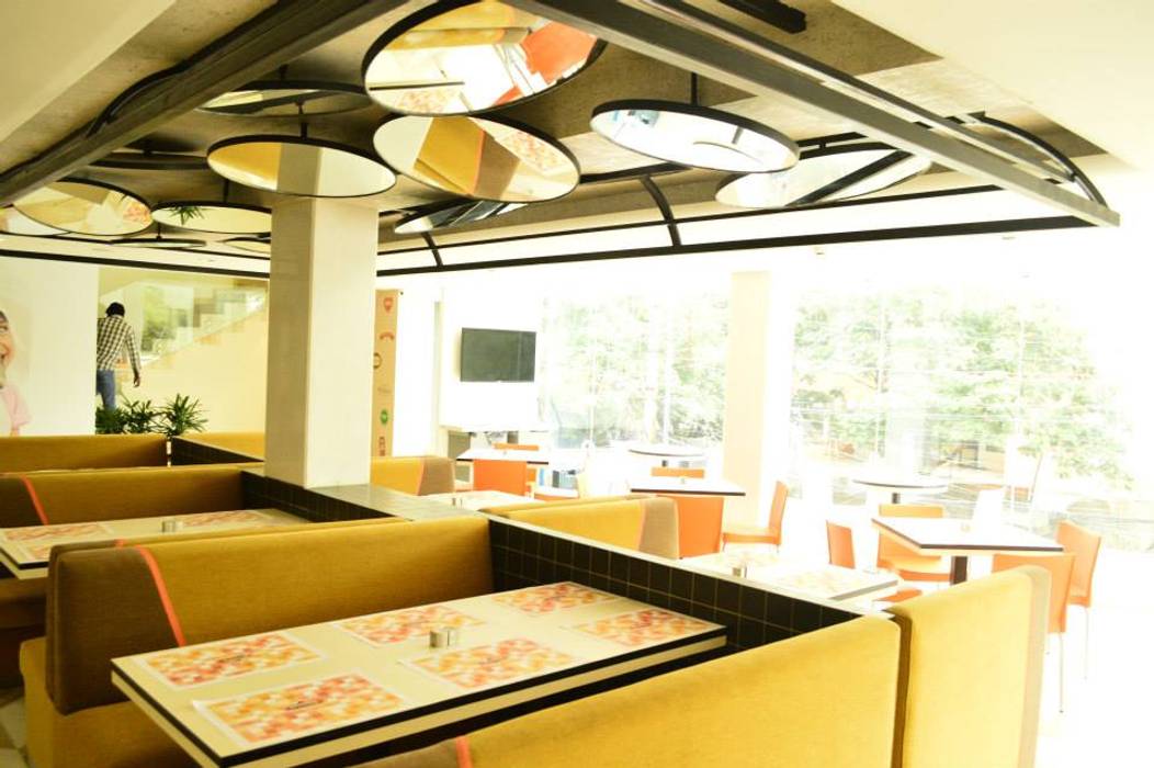 Innovative Ceiling Design With Mirror In Restaurant Dining