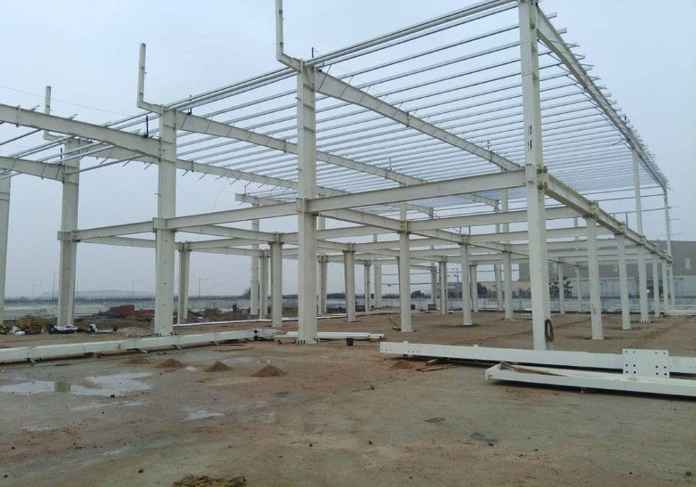 INDUSTRIAL RUNNING WORK AT SANAND, Monoceros Interarch Solutions Monoceros Interarch Solutions Flat roof Iron/Steel