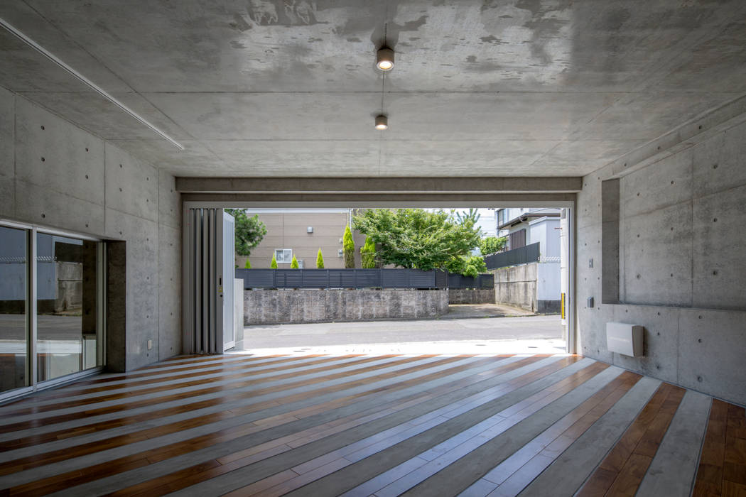 D-fancy/box(車庫兼プライベートルーム), アトリエ間居 アトリエ間居 Prefabricated Garage Concrete