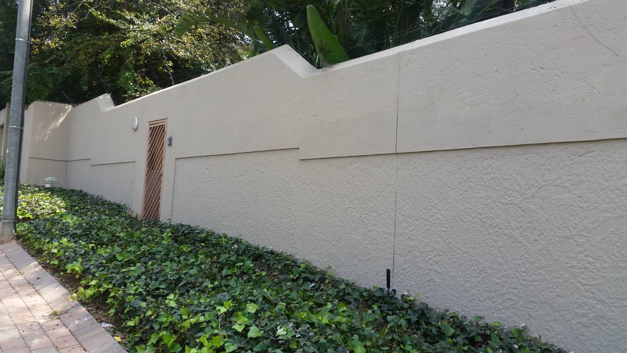 Boundary wall plastering and painting homify Boundary wall,painting,plastering,building