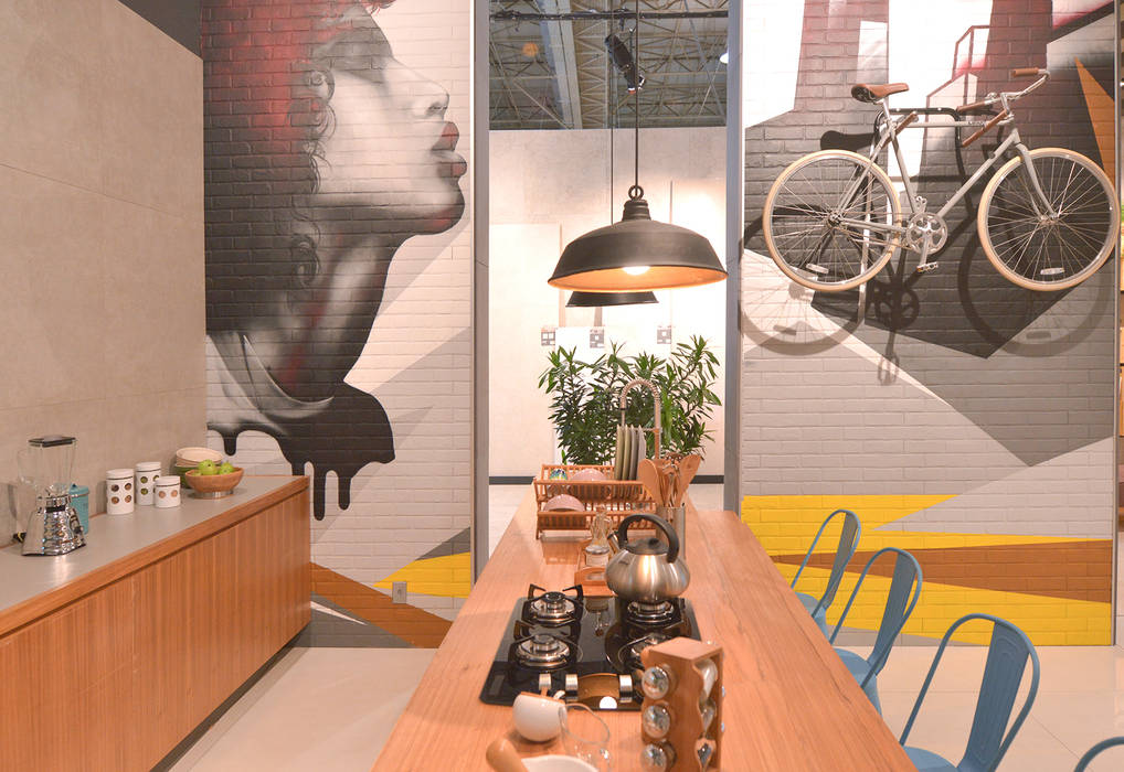 Cozinha com acabamentos porcelanato e marcenaria Estudio Piloti Arquitetura Espaços comerciais Tijolo Cozinha em ilha,utensílios de cozinha,loft,cozinha loft,grafite,bike,Espaços comerciais