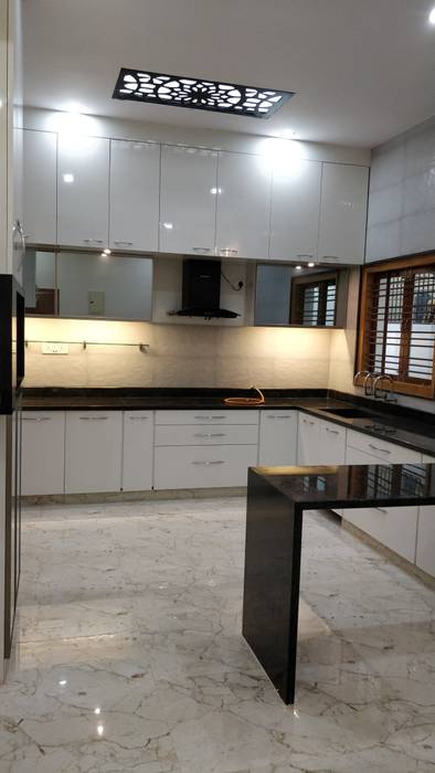 Anand Krishna Residence, Geometrixs Architects & Engineers Geometrixs Architects & Engineers Muebles de cocinas Aluminio/Cinc