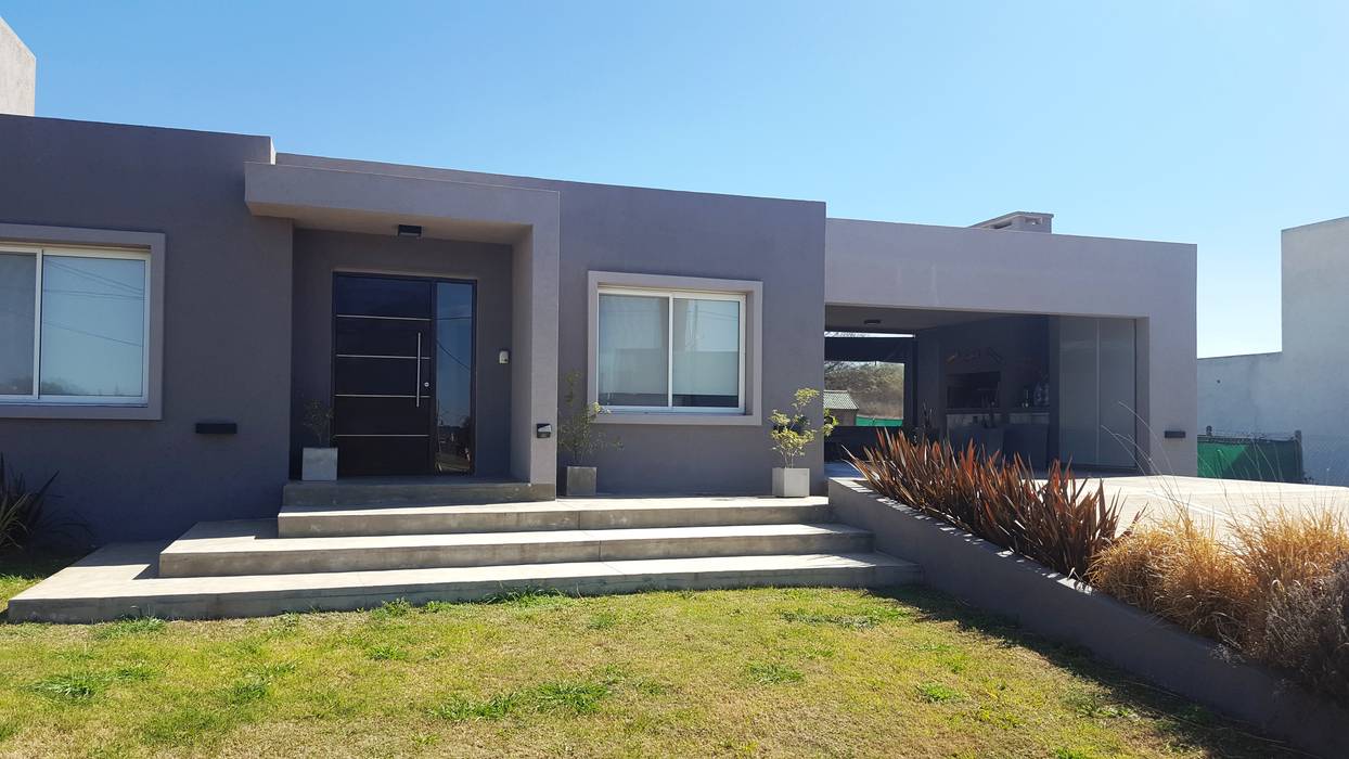 Fachada moderna en tonos de gris de integra estudio moderno | homify