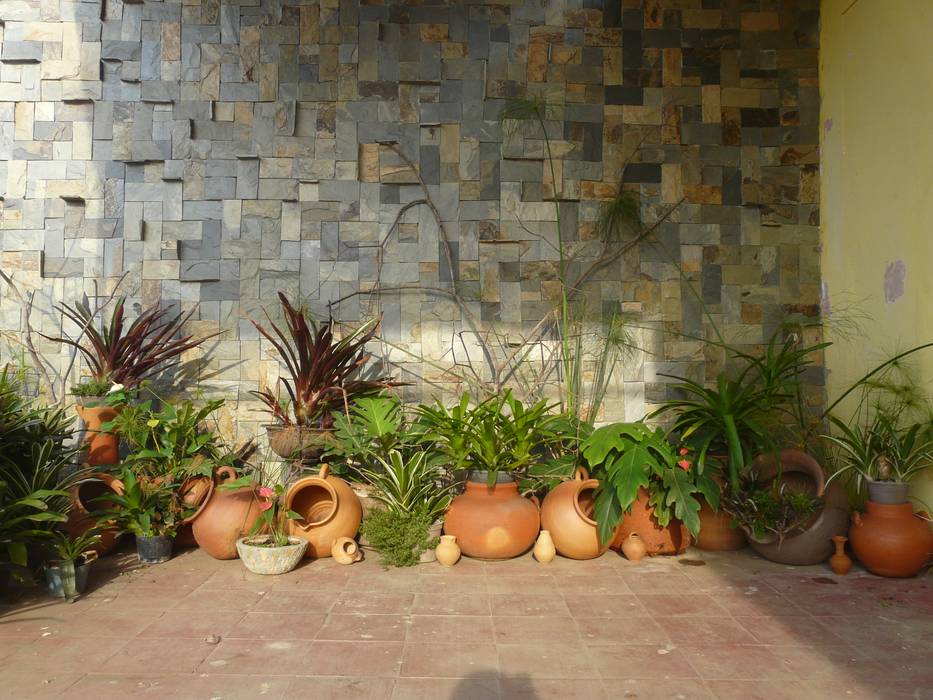 paisajismo en terraza, ESTUDIO KULUMAK ESTUDIO KULUMAK Jardines con piedras Piedra