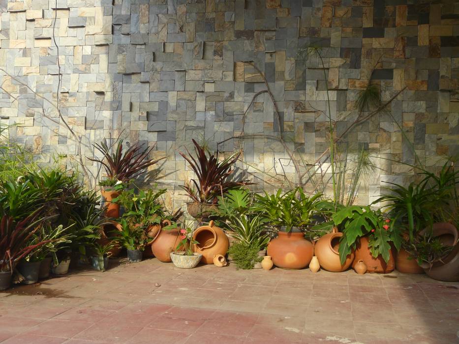 paisajismo en terraza, ESTUDIO KULUMAK ESTUDIO KULUMAK Jardines con piedras Piedra