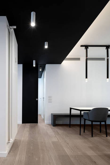 La zona ingresso homify Ingresso, Corridoio & Scale in stile moderno Legno Effetto legno soffitto nero,faretti,bianco e nero,basaltina
