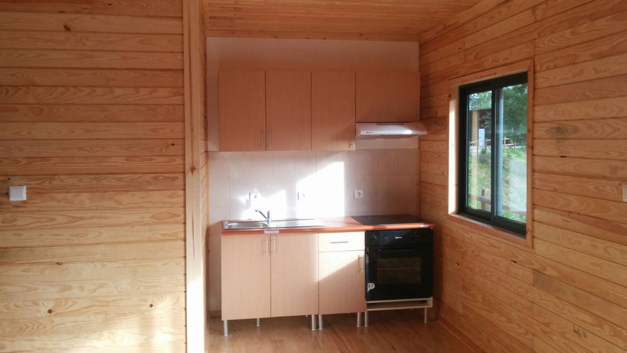 Modelo | T2 62m² por Discovercasa | Casas de Madeira & Modulares Moderno Madeira Efeito de madeira