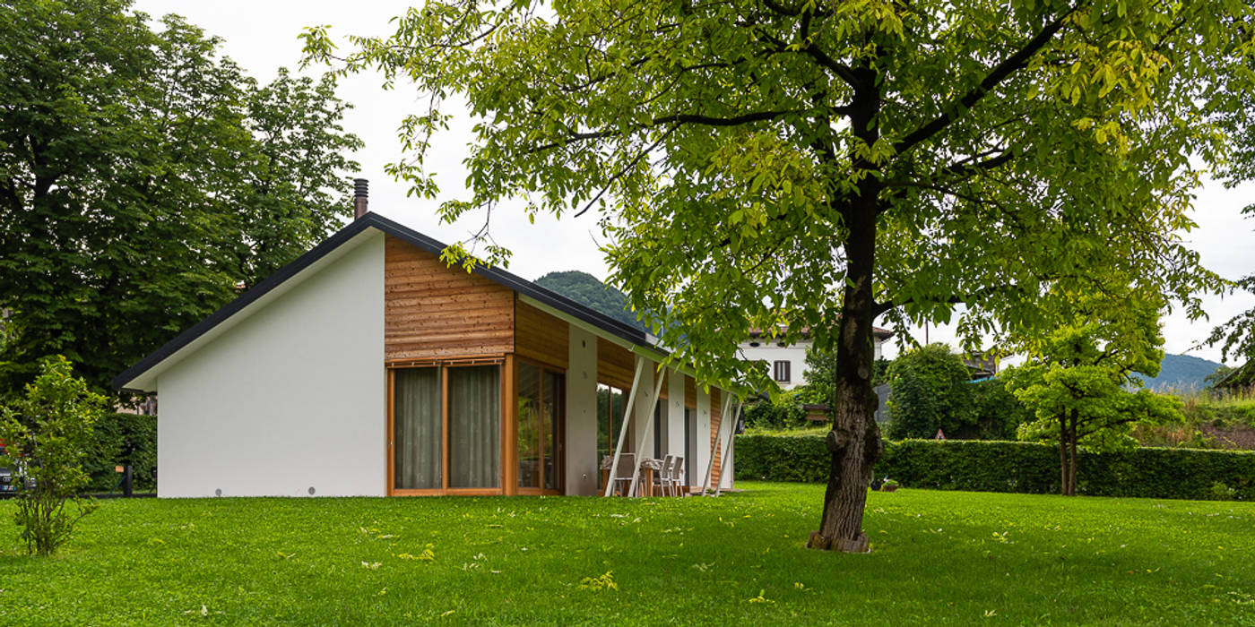 Piccoli grandi spazi abitativi Woodbau Srl Casa di legno casa in legno,larice