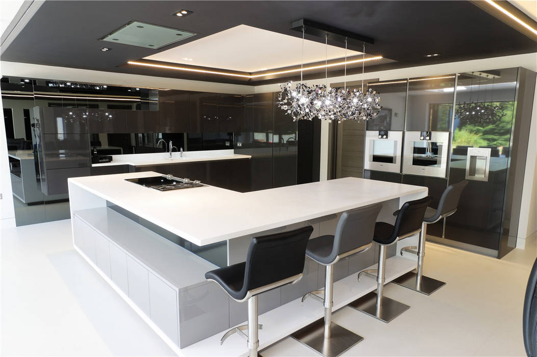 A Luxurious Living Space in Designer White PTC Kitchens Aneks kuchenny corian,corian worktops,luxury,luxury kitchen,grey kitchen,white kitchen,peressini casa,quooker,gaggenau,gutmann,kitchen island,pendant lights