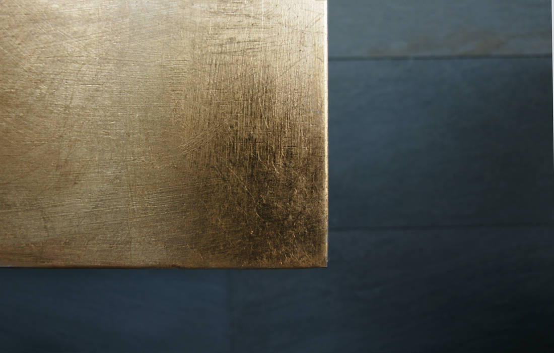 Slidding panel detail. Studioapart Interior & Product design Barcelona Modern living room detail,gold,furniture