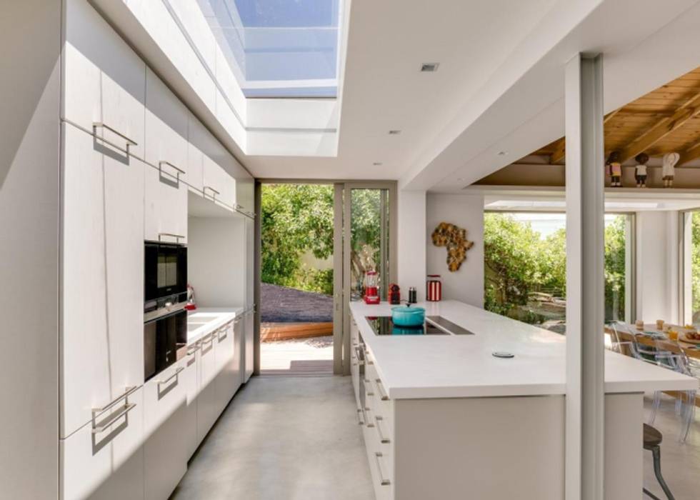 Kitchen & Skylight Van der Merwe Miszewski Architects Built-in kitchens MDF cemcrete floors,skylight,white tops,gaggenau appliances