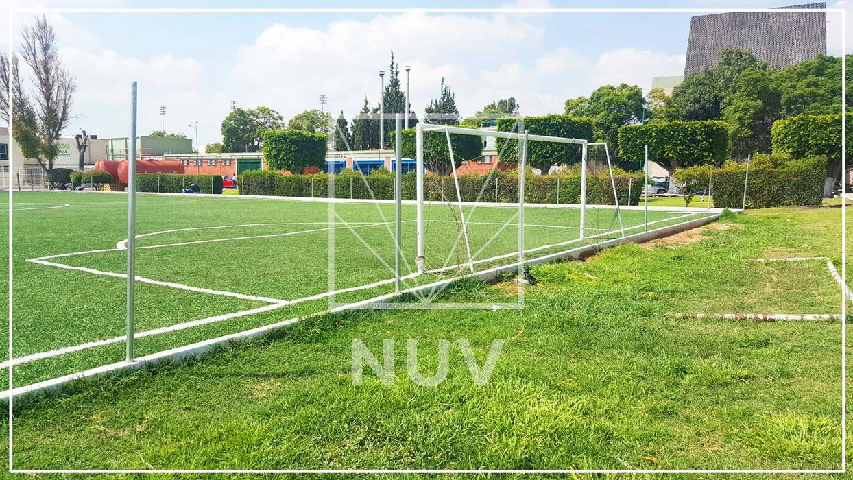 Parques / Campo de fútbol, NUV Arquitectura NUV Arquitectura مساحات تجارية ألواح خشب مضغوط ستاد رياضي