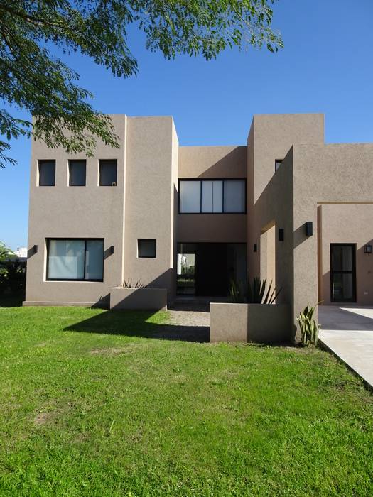 Casa estilo minimalista en Santa Teresa, Tigre Estudio Dillon Terzaghi Arquitectura - Pilar Casas unifamiliares Ladrillos