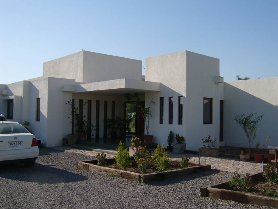 CASA CERDA AOG Casas unifamiliares Concreto casa de ladrillo