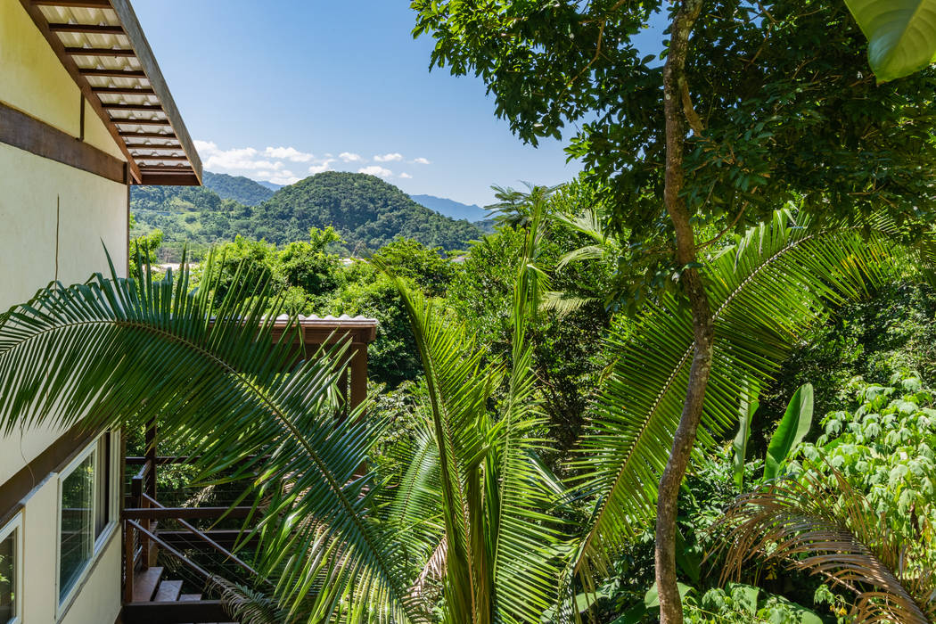 Casa Félix, NOMA ESTUDIO NOMA ESTUDIO Chalés e casas de madeira