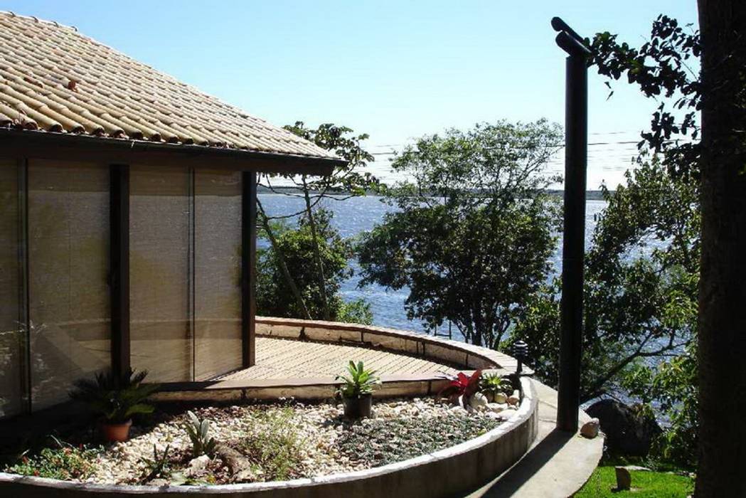Residência Costa da Lagoa - Florianópolis / SC, Raiz Arquitetônica Raiz Arquitetônica Chalés e casas de madeira