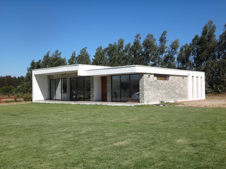 Vivienda Garrido por ARKITEKTURA, ARKITEKTURA ARKITEKTURA Casas unifamiliares