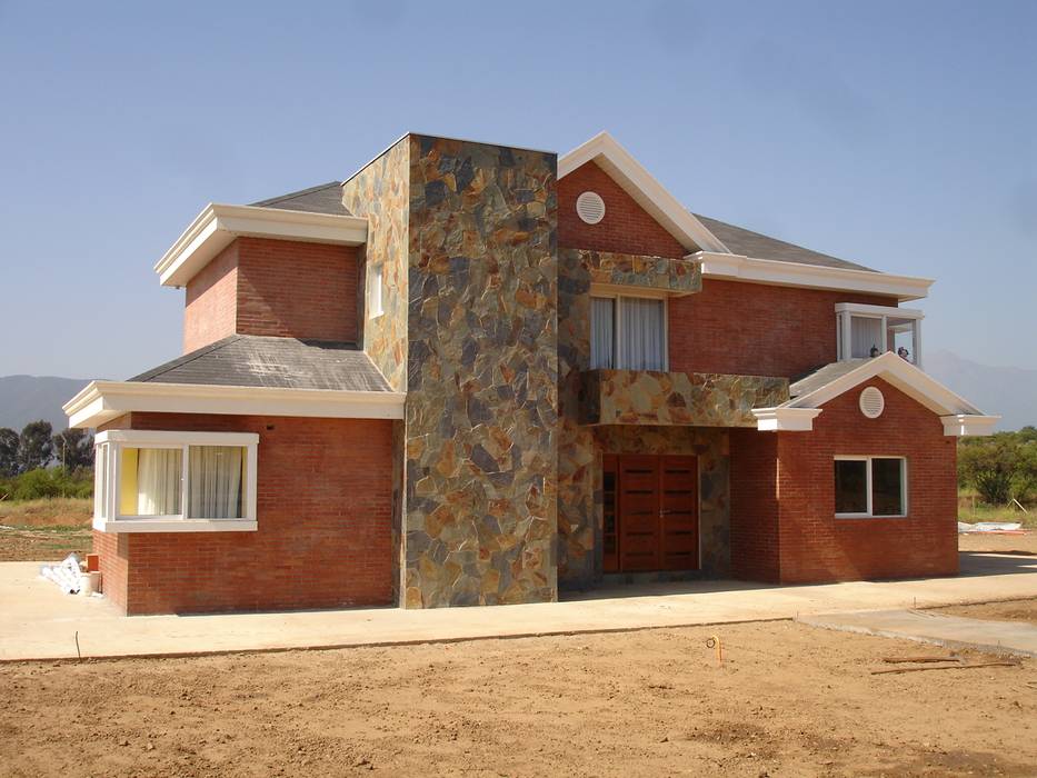 FACHADA SUR ARKITEKTURA Casas unifamiliares Ladrillos