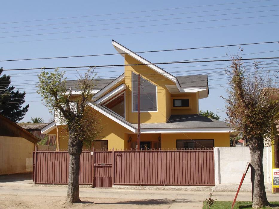 FACHADA PONIENTE ARKITEKTURA Casas unifamiliares Ladrillos