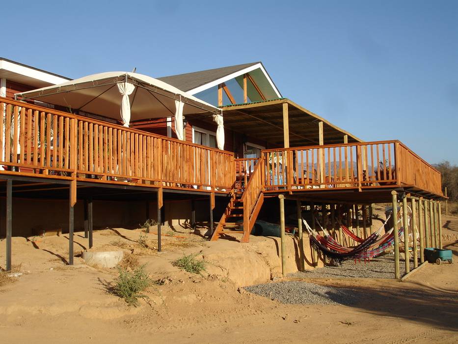 TERRAZA ARKITEKTURA Casas unifamiliares Madera Acabado en madera