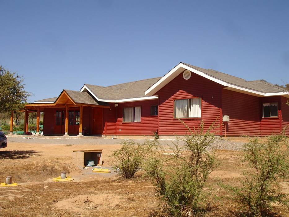 Vivienda González por ARKITEKTURA, ARKITEKTURA ARKITEKTURA 一戸建て住宅 木材・プラスチック複合ボード