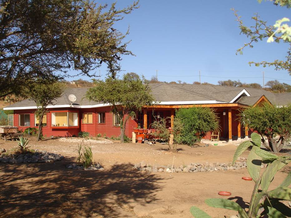 FACHADA NOR-ORIENTE ARKITEKTURA Casas unifamiliares Compuestos de madera y plástico