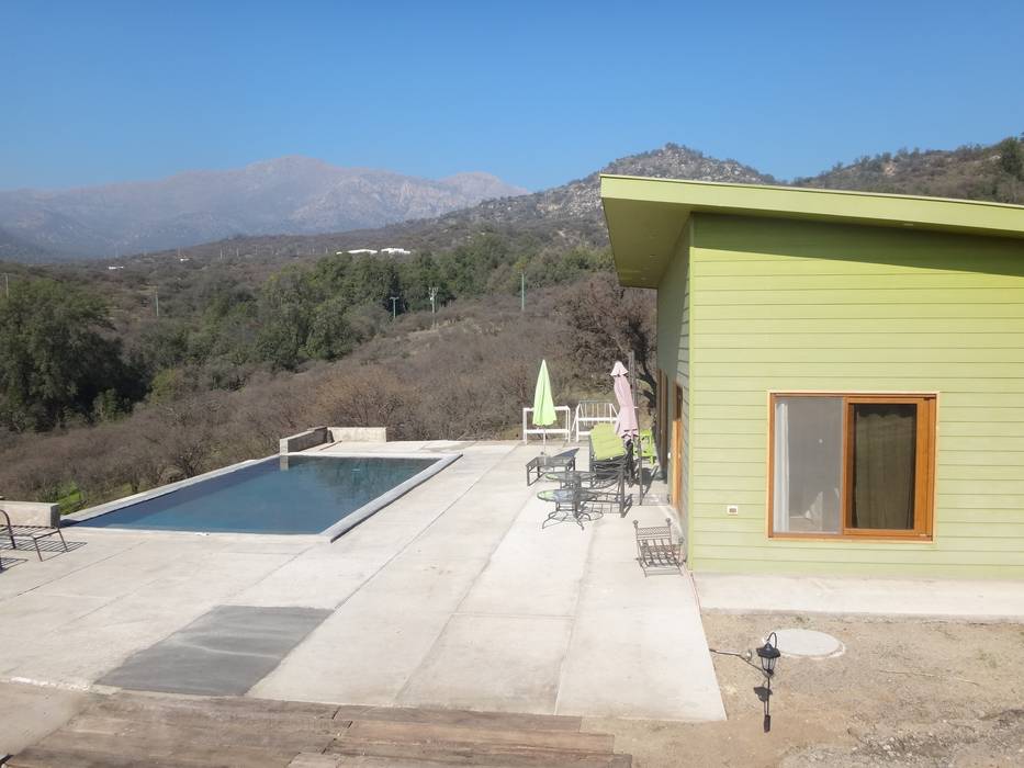 FACHADA PONIENTE ARKITEKTURA Casas unifamiliares Madera Acabado en madera