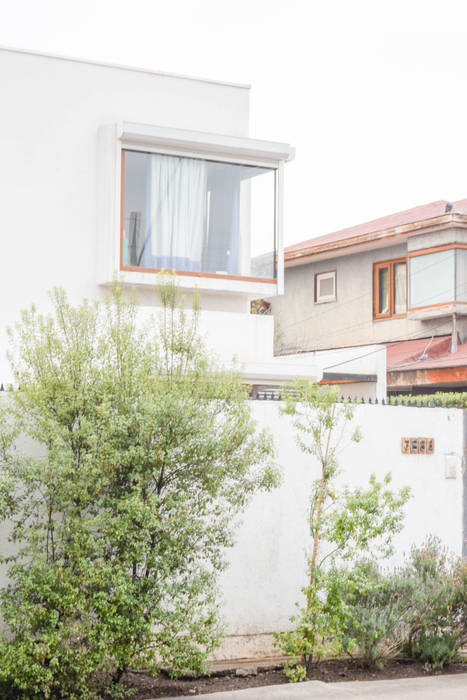 Remodelación de Casa Islas Fidji por Arqbau, Arqbau Ltda. Arqbau Ltda. Ventanas de madera