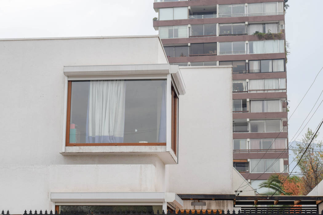 Remodelación de Casa Islas Fidji por Arqbau, Arqbau Ltda. Arqbau Ltda. Wooden windows