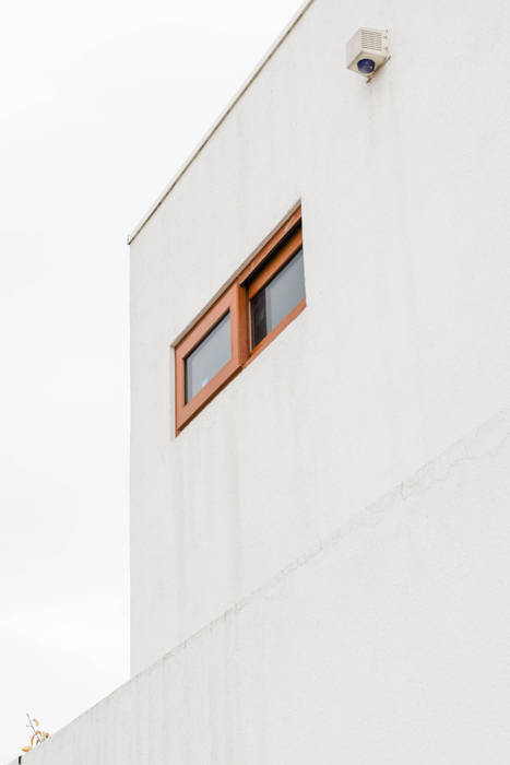 Remodelación de Casa Islas Fidji por Arqbau, Arqbau Ltda. Arqbau Ltda. Wooden windows