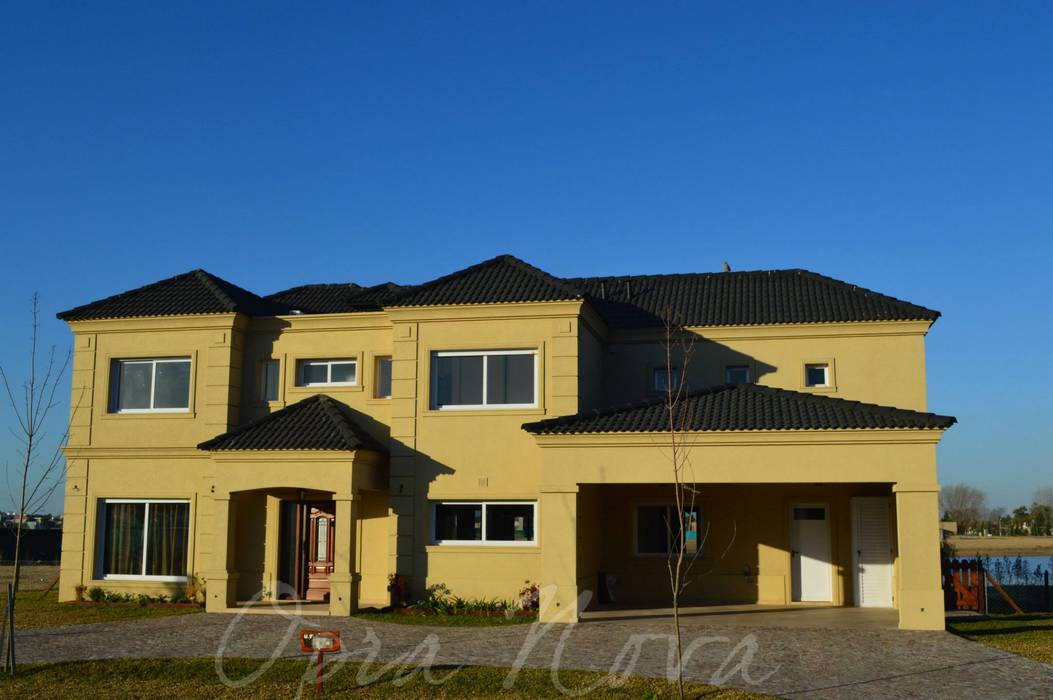 Fachada Opra Nova - Arquitectos - Buenos Aires - Zona Oeste Casas unifamiliares