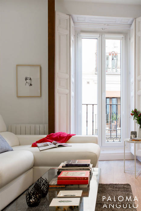 Un PEQUEÑO APARTAMENTO en color blanco muy acogedor, Interiorismo Paloma Angulo Interiorismo Paloma Angulo ห้องนั่งเล่น