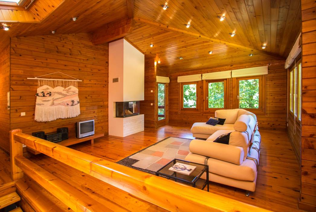 Casa unifamiliar pré-fabricada 108m² em Valdozende, RUSTICASA RUSTICASA Rustic style living room Solid Wood Multicolored