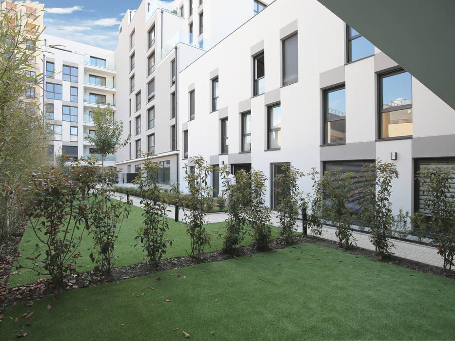 Interior gardens of the housing block OGGOstudioarchitects, unipessoal lda Multi-Family house Collective housing,Carnot,garden