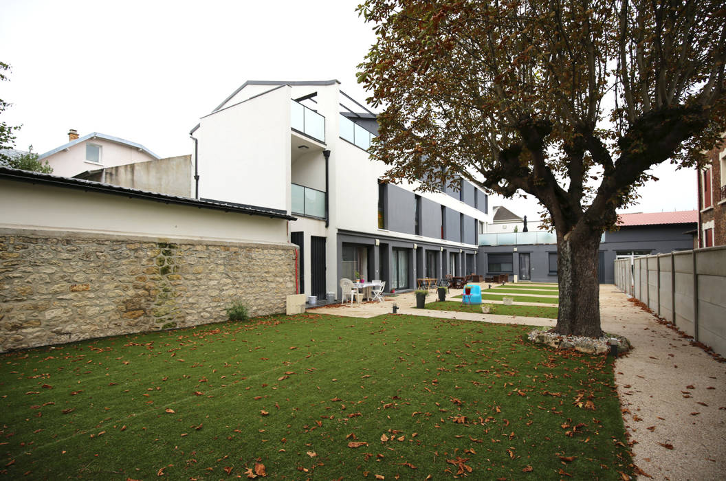 Old factory place converted in a residential project of housing units OGGOstudioarchitects, unipessoal lda Viviendas colectivas Housing,old,factory,building,monochromatic