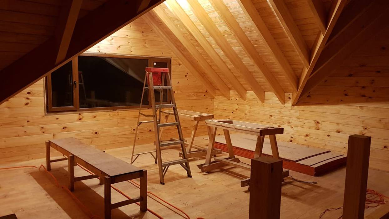 Construcción de Casa de madera en Pucón, Chile. Patagonia Log Homes - Arquitectos - Neuquén Techos a dos aguas Madera Acabado en madera