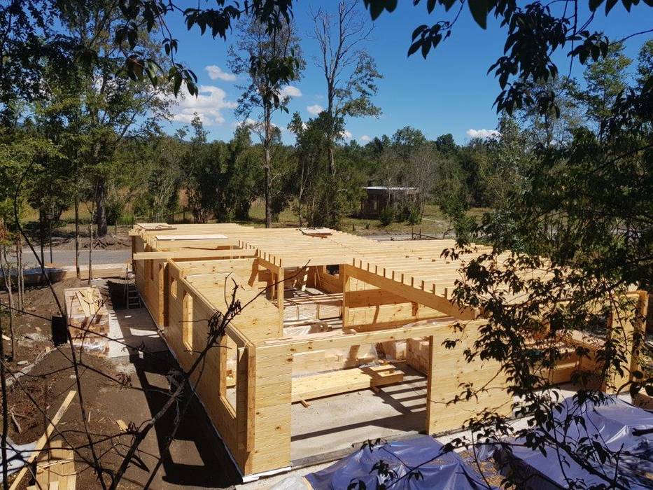 Construcción de Casa de madera en Pucón, Chile. Patagonia Log Homes - Arquitectos - Neuquén Casas de madera Madera Acabado en madera madera,casa de madera,exterior de madera,panel de madera para pared,columna de madera,piso de madera,viga de madera,ventanas de madera,construccion,troncos,estructura,chile